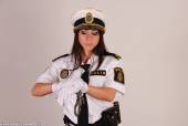 CuffedinUniform Melissa - Poliskvinnan gets hogcuffed - set 313-l74cg0u50x.jpg